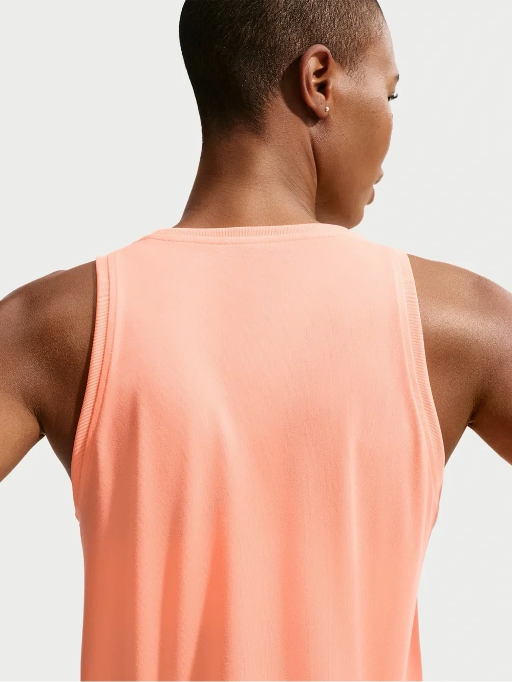 Nike Women's Coral Performance Tank Top in Peach
